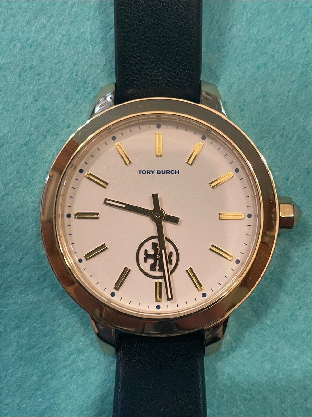 Tory Burch White Dial Watch with Gold-Tone Case and Black Strap       TBW 1205